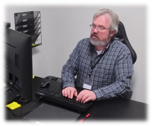 Jason Waeber at Desk