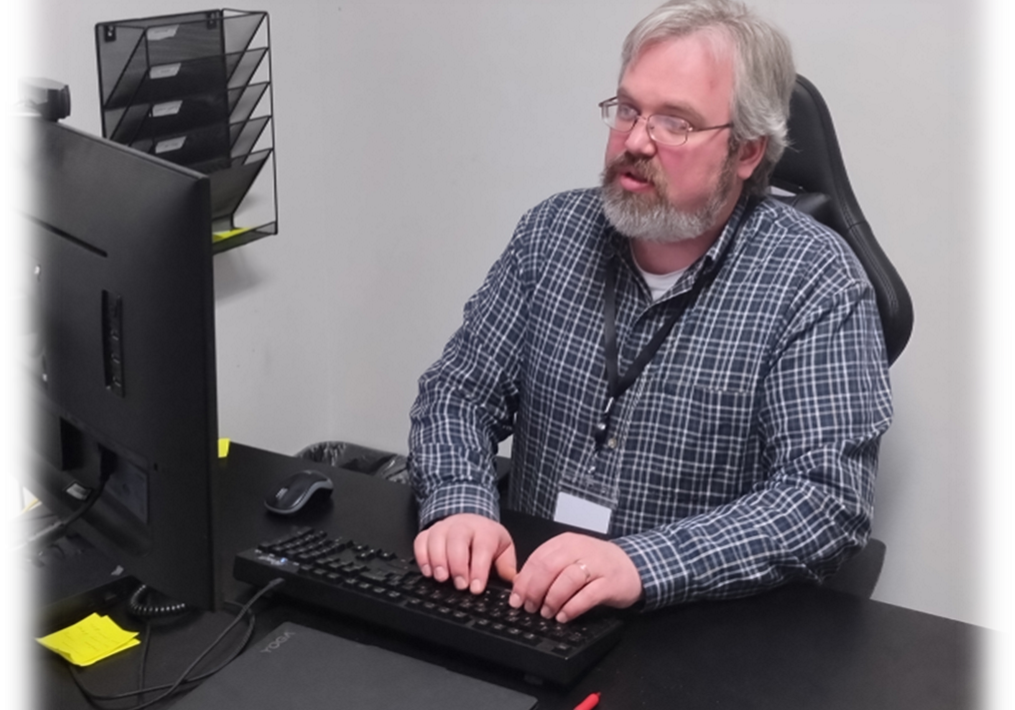 Jason Waeber at Desk